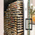 Wine Stash Custom Sloped Wine Rack Behind Glass Door