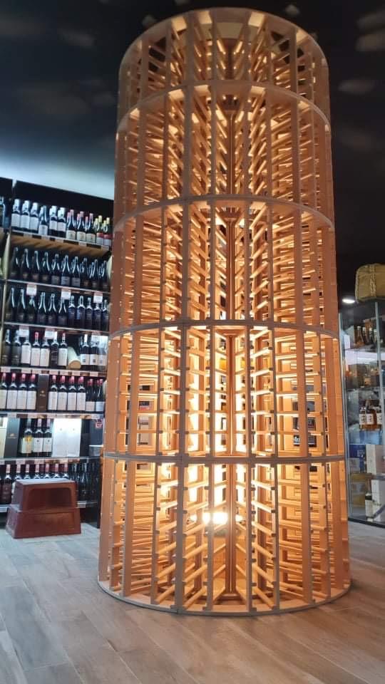 Wine Column with Additional Half Height Cubes to achieve floor-to-ceiling design
